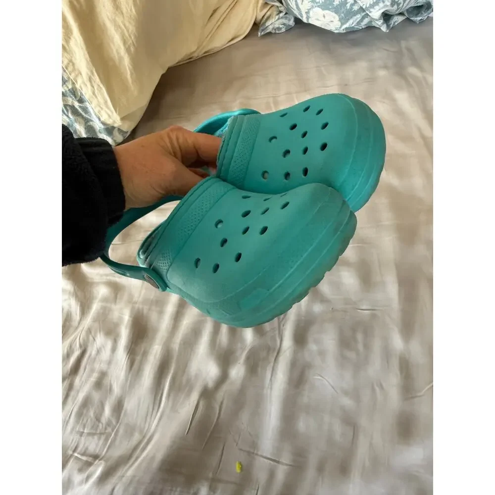 Crocs teal fleece lines size J2